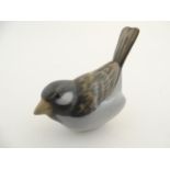 A Royal Copenhagen model of a sparrow, model no. 1081. Marked under. Approx. 3" high. Please