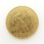 A French Republic 20 franc gold coin, 1910, approx. 6.45g Please Note - we do not make reference