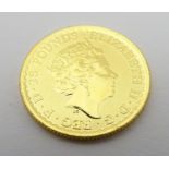 A 2018 gold Britannia 1/4 oz coin. Approx. weight 7.80g Please Note - we do not make reference to