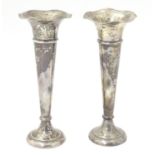 A pair of silver trumpet shaped bud vases. Hallmarked Chester 1907 Maker Jay, Richard Attenborough