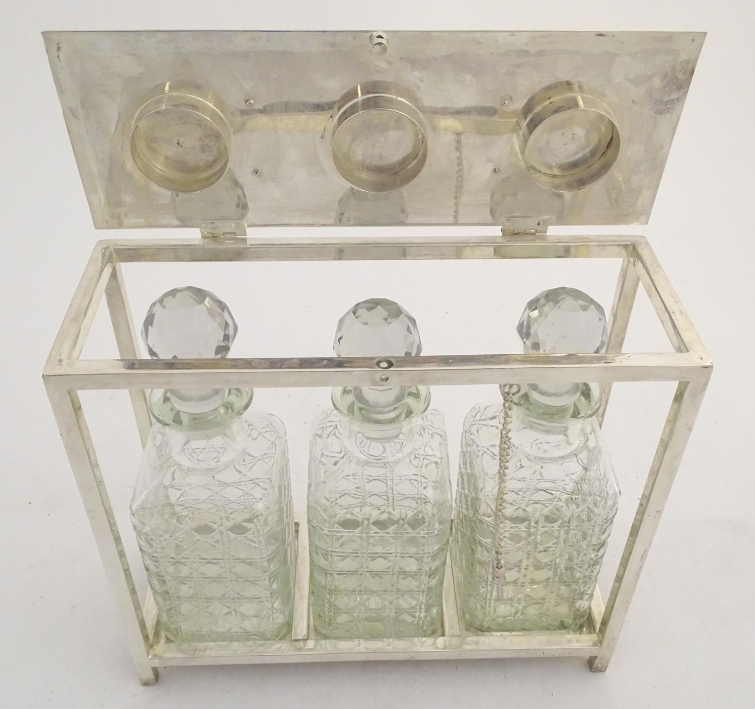 A Dr Christopher Dresser style tantalus with provision for three decanters. Approx. 11 1/2" high - Image 11 of 27