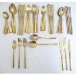 A 5-place set of mid-20thC modernist bronze cutlery by Sigvard Bernadotte probably for Scanline,