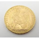 A French Republic 20 franc gold coin, 1911, approx. 6.45g Please Note - we do not make reference