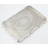 A Victorian silver visiting card case with engraved decoration hallmarked London 1867 maker Robert
