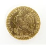 A French Republic 20 franc gold coin, 1911, approx. 6.45g Please Note - we do not make reference