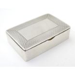 A Victorian silver vesta keep / snuff / pill box of rectangular form with engine turned decoration