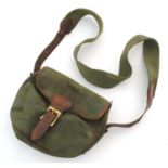 A Payne-Gallwey pattern shotgun cartridge bag, of green canvas and brown leather construction with