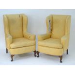 A pair of a early /mid 20thC Queen Anne style armchairs for re-upholstery. 33 1/2" wide x 29" high x