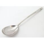 A Russian silver spoon with engraved decoration to reverse of bowl. Approx 5 1/2" long Please Note -