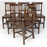 A set of six early 19thC mahogany dining chairs with shaped and reeded top rails, reeded slatted