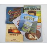 An assortment of Country, Folk and Traditional music, comprising three 33 1/3rpm vinyl record box