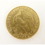 A French Republic 20 franc gold coin, 1912, approx. 6.45g Please Note - we do not make reference
