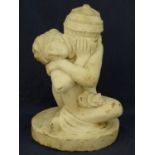 A marble sculpture depicting a seated nude woman supporting a lidded vase on her shoulder. Raised on