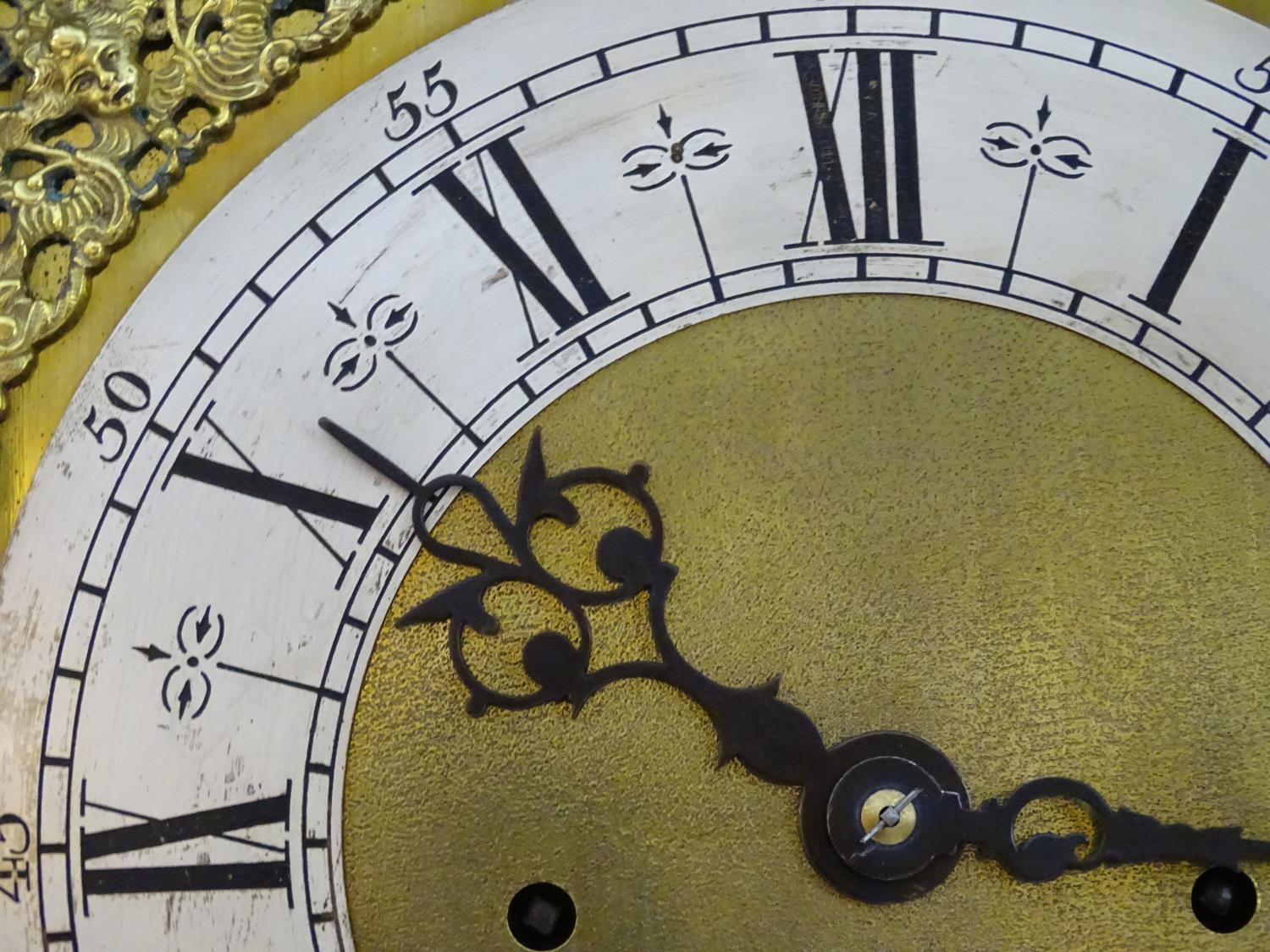 A c.1920 longcase / grandmother clock having an 8 day movement, Westminster chimes, having an ornate - Image 23 of 27