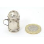 A Victorian miniature novelty pepperette formed as a flour shaker, hallmarked Chester 1894, maker