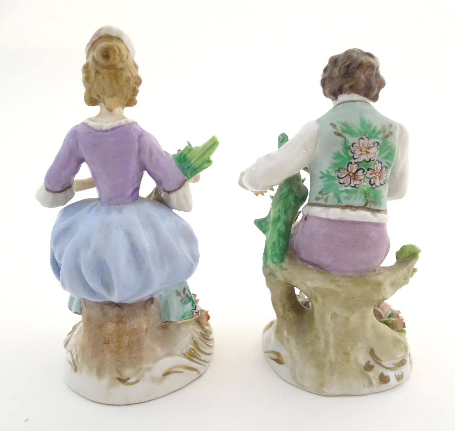 A pair of German Sitzendorf porcelain florist figures, a gentleman and lady, each seated on a - Image 11 of 20