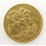 An 1899 gold Victoria sovereign coin. Approx. weight 8g Please Note - we do not make reference to