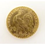 A French Republic 20 franc gold coin, 1911, approx. 6.45g Please Note - we do not make reference