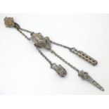 A Victorian silver plate housekeeper's chatelaine with Egyptian Revival pharaoh head detail, etc.