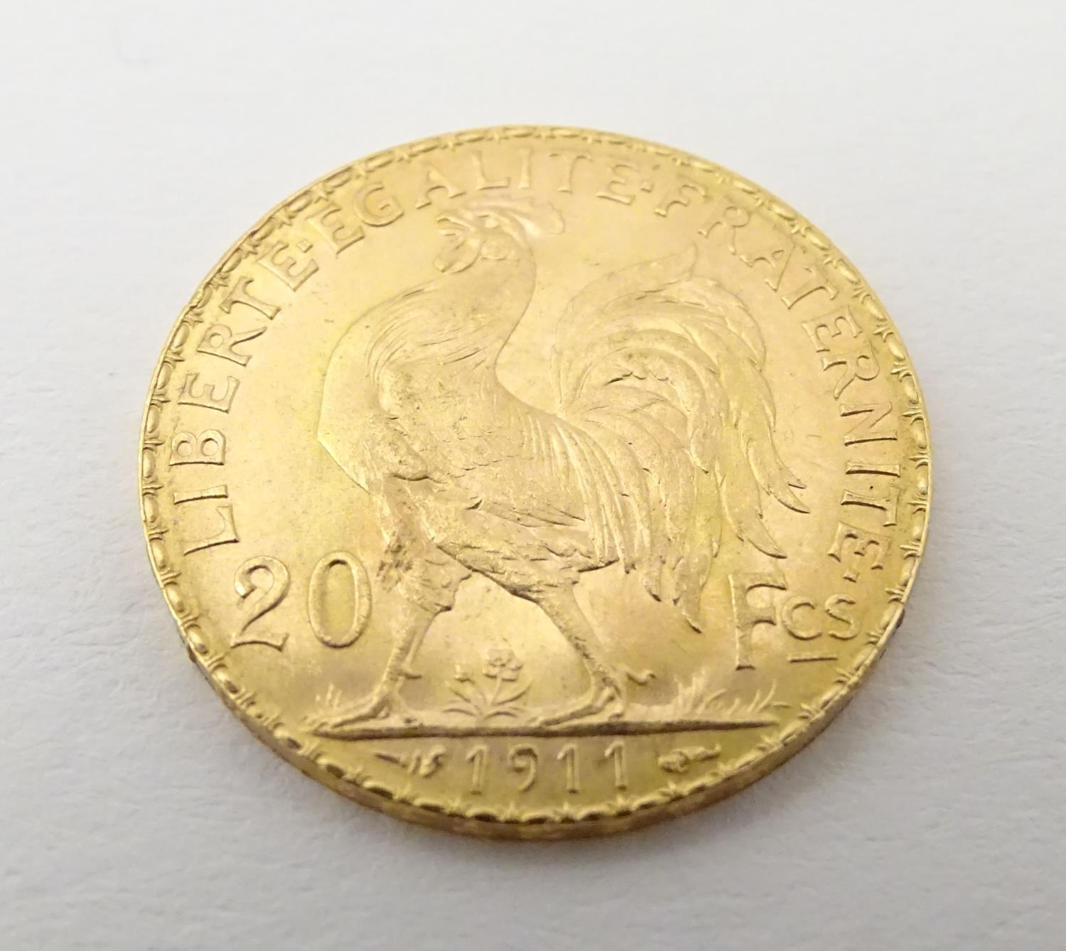 A French Republic 20 franc gold coin, 1911, approx. 6.45g Please Note - we do not make reference - Image 2 of 10