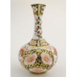 A 19thC Stevenson and Hancock Derby vase decorated with flowers in the Imari palette. Marked