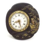 An unusual clock / timepiece, the enamelled dial and movement set within a Tsuba from a Japanese