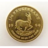 A 1994 gold South African 1/4 Krugerrand coin. Approx. weight 8.52g Please Note - we do not make