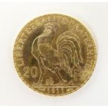 A French Republic 20 franc gold coin, 1911, approx. 6.45g Please Note - we do not make reference