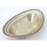 An American Sterling silver dish of oval form with fretwork detail. Maker Bigelow - Kennard & Co