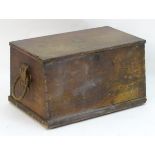 A 19thC mahogany trunk with rope handles to each side, the trunk opening to show a candle box
