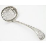 A Victorian silver sifter / caster spoon hallmarked London 1847 maker Robert Wallis 6 1/2" long (