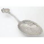 A Dutch silver caddy spoon, the handle with hart detail, the bowl decorated with figures dancing 5