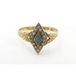 A Victorian 15ct gold ring set with central turquoise and seed pearl. Ring size approx L 1/2