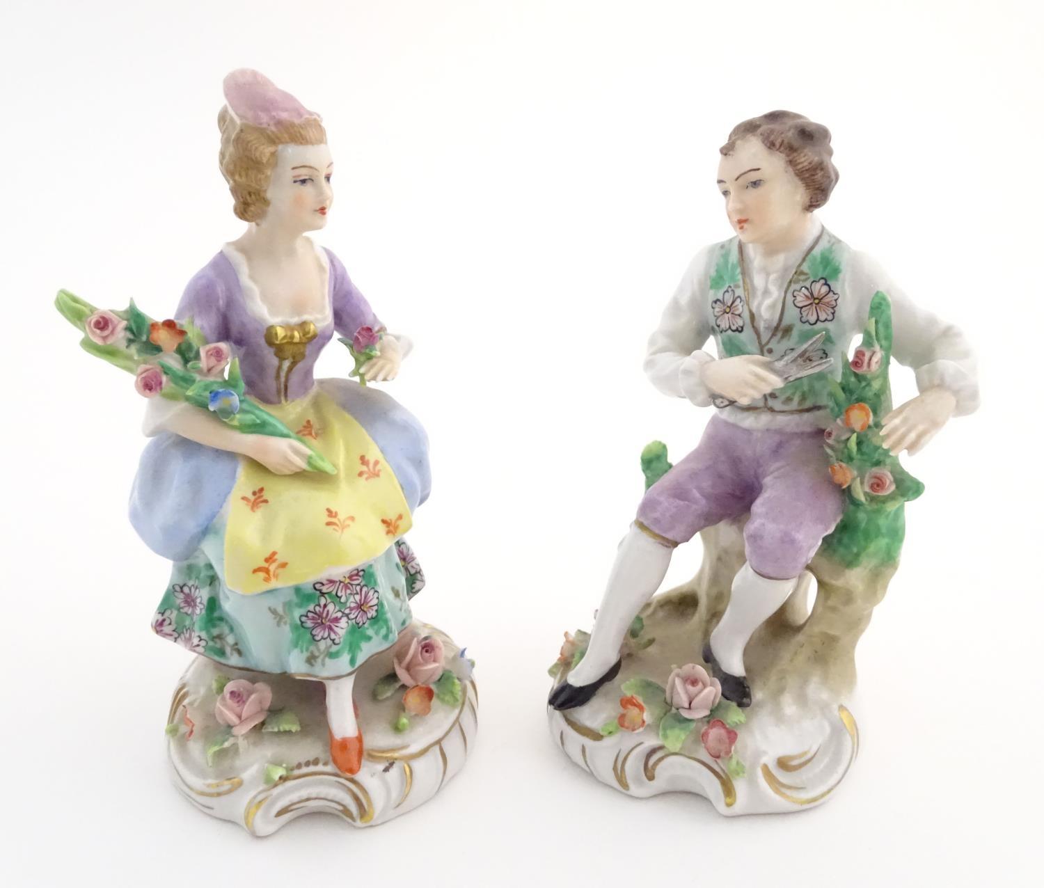 A pair of German Sitzendorf porcelain florist figures, a gentleman and lady, each seated on a - Image 6 of 20