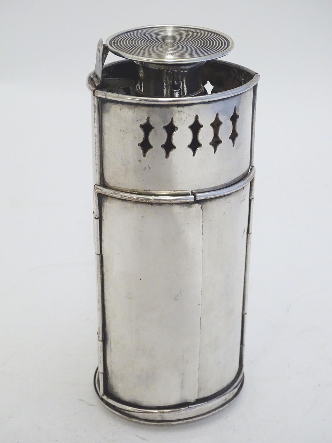 A 19thC silver plate travelling candle lantern with pierced decoration and double doors. Contained - Image 22 of 23