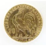 A French Republic 20 franc gold coin, 1912, approx. 6.45g Please Note - we do not make reference