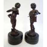 Two 20thC cast cherub figures after Auguste Moreau (1834-1917), one playing a drum, the other