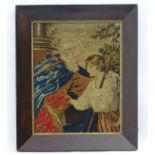 A Victorian wool work depicting a gentleman and a young figure with staff, in a rosewood frame, c.