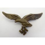 Militaria: a WWII / WW2 / Second World War Luftwaffe metal cap badge, 2 5/8" wide Please Note - we