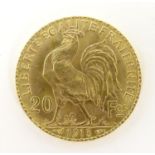 A French Republic 20 franc gold coin, 1913, approx. 6.45g Please Note - we do not make reference