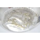 A Continental white metal pin dish with embossed lion decoration. Marked S.800 3 1/4" diameter