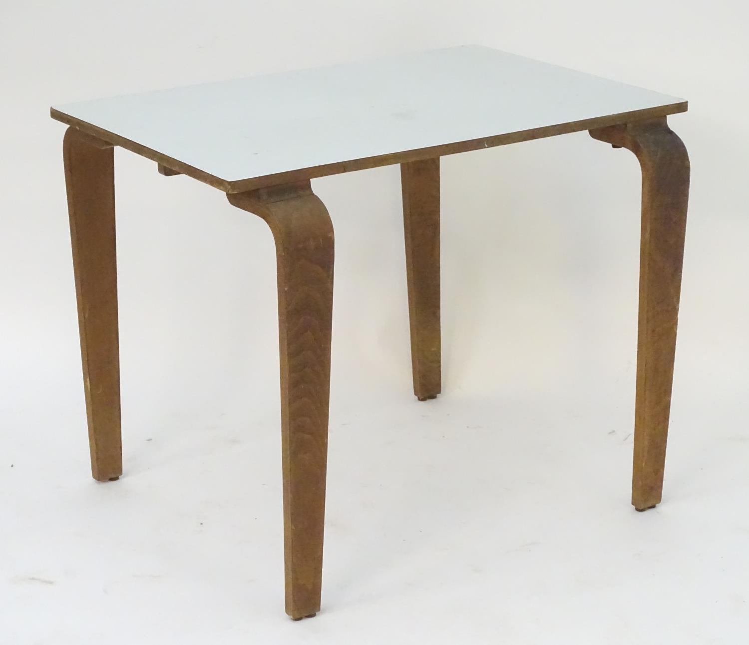 A mid 20thC table with a rectangular top above shaped tapered oak legs. 36" long x 24" wide x 29" - Image 7 of 13