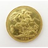 An 1890 gold Victoria sovereign coin. Approx. weight 8g Please Note - we do not make reference to
