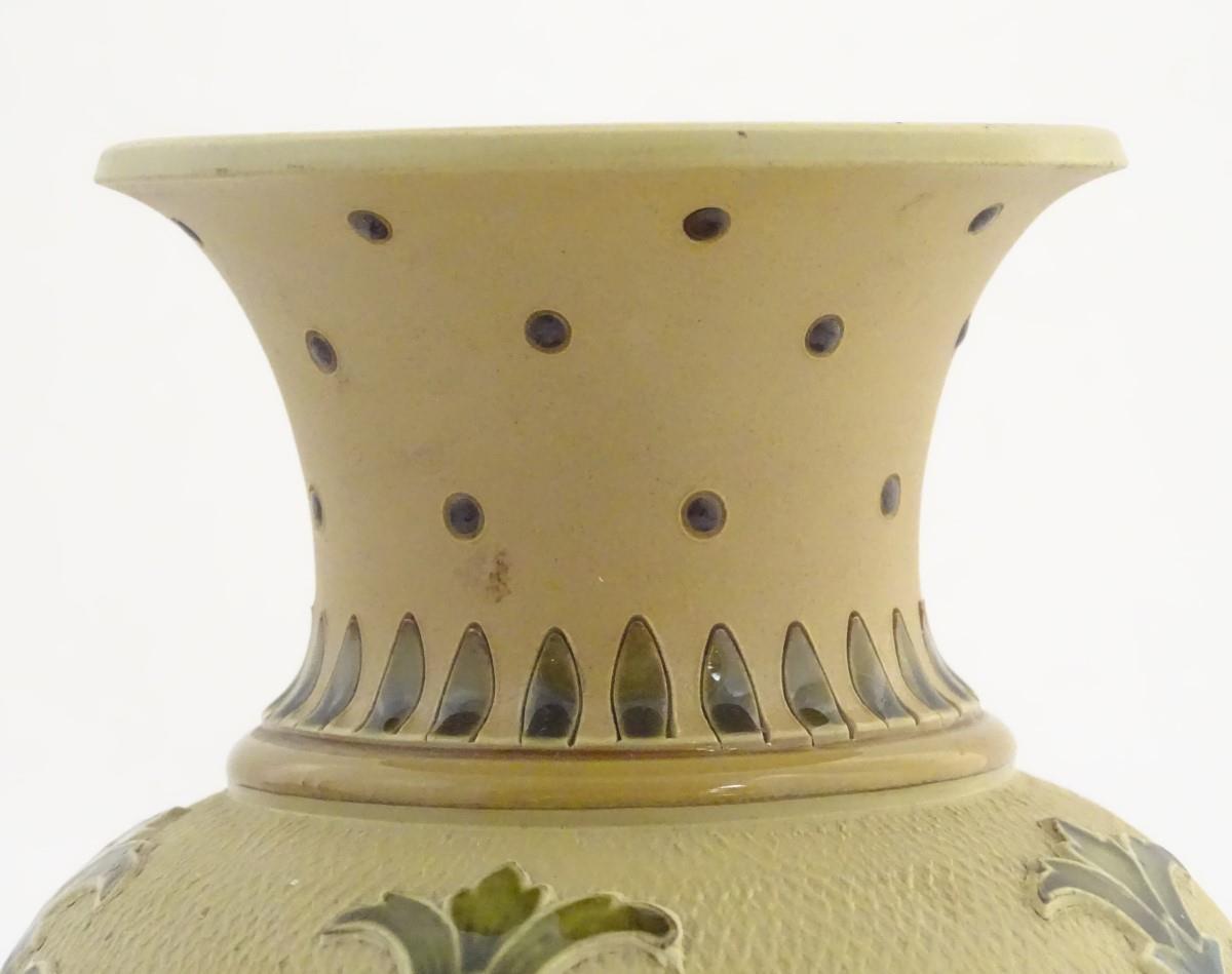 A Mettlach vase with a flared rim and bulbous body, decorated with sylised floral and foliate motifs - Image 6 of 15
