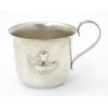 A Danish silver plate child's mug with duck decoration. Marked under JT(H)S Denmark. Probably by