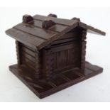 A 20thC German / Swiss novelty wooden inkwell formed as alpine chalet. Approx. 2 1/4" high Please
