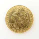 A French Republic 20 franc gold coin, 1913, approx. 6.45g Please Note - we do not make reference