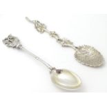 A silver teaspoon, the handle decorated with tall ship / galleon. Hallmarked Sheffield 1892 maker
