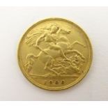 A 1906 gold Edward VII half sovereign coin. Approx. weight 4g Please Note - we do not make reference