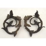 A pair of Victorian cast curtain holdbacks with foliate decoration. Approx. 6" diameter (2) Please